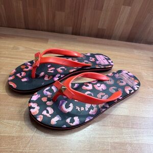 Kate Spade New York "Nimi" leopard flip flops size 7, red and black
